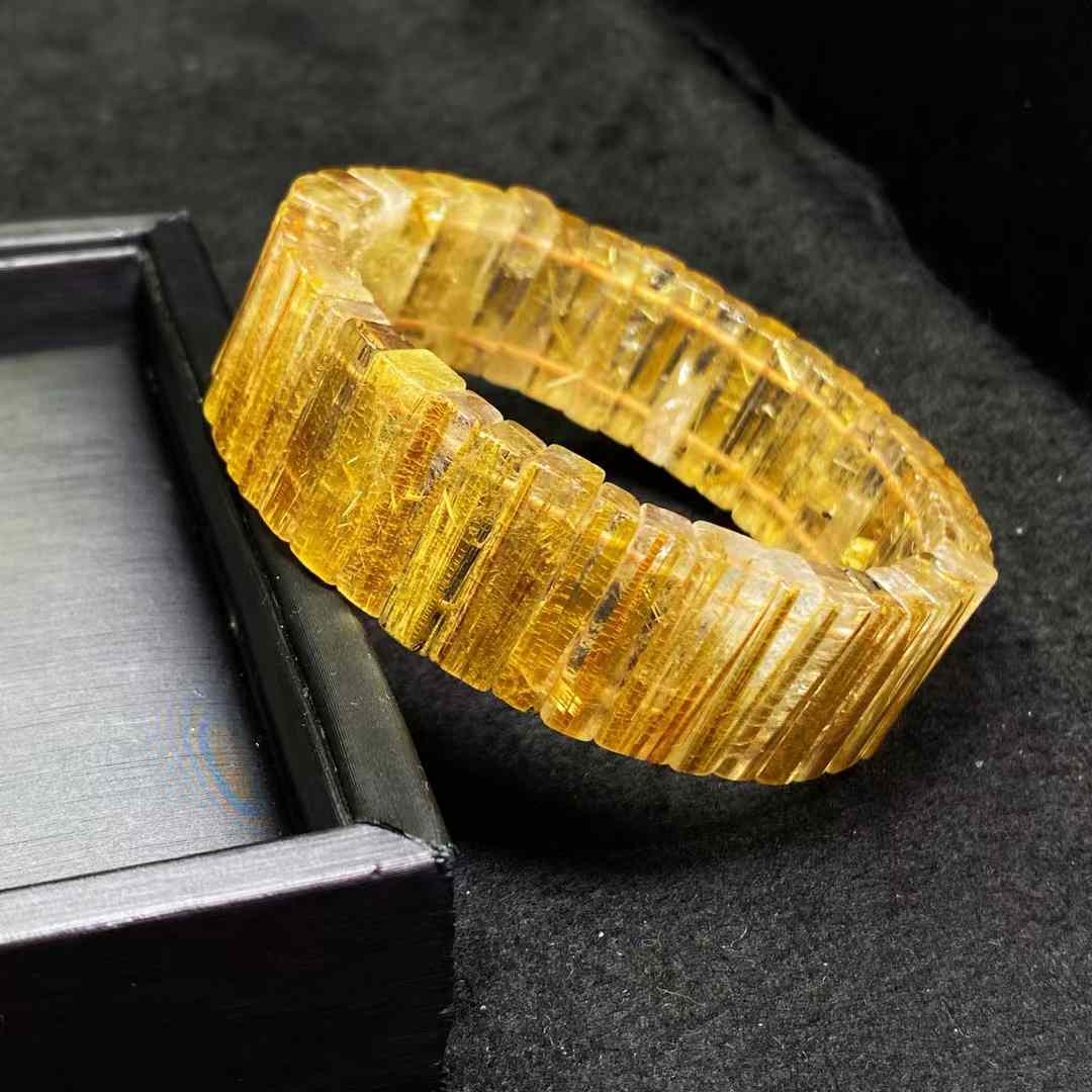 Natural titanium crystal hand row, smooth hair, specifications: 20*5*6 mm, weight: 70 grams