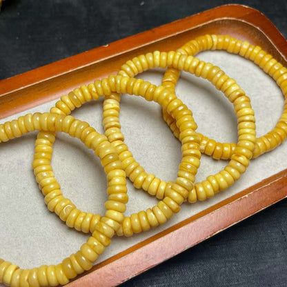 Beeswax disc bead bracelet size 7mm or so, special price 45 US dollars/piece.