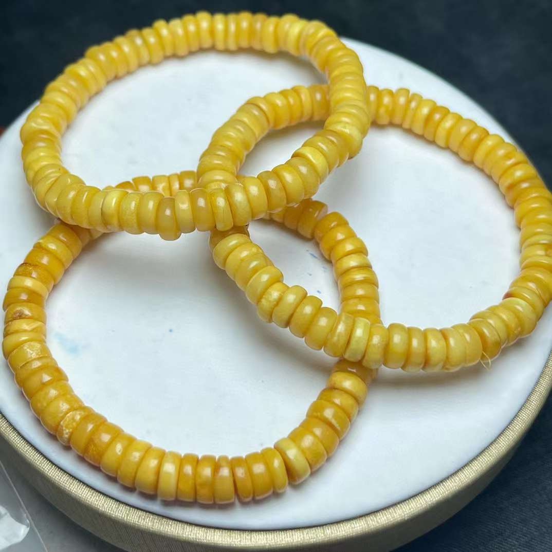 Beeswax disc bead bracelet size 7mm or so, special price 45 US dollars/piece.