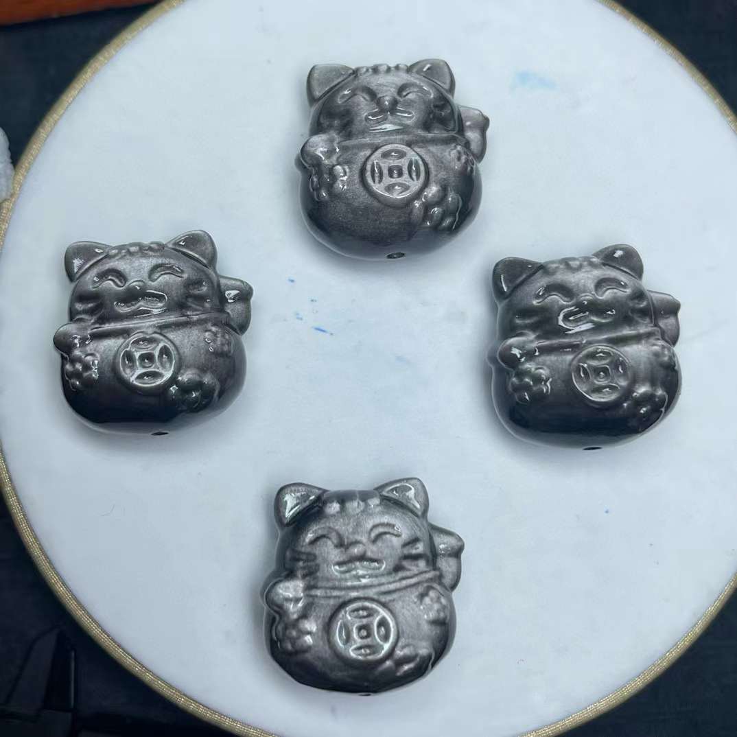 Silver obsidian fortune cat carved through the hole, the specification is about 27mm, the special price is 12 US dollars/piece